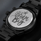 Water resistant and scratch proof Black Chronograph Watch with a three-dial face and calendar function. Dream Big engraved on the back.
